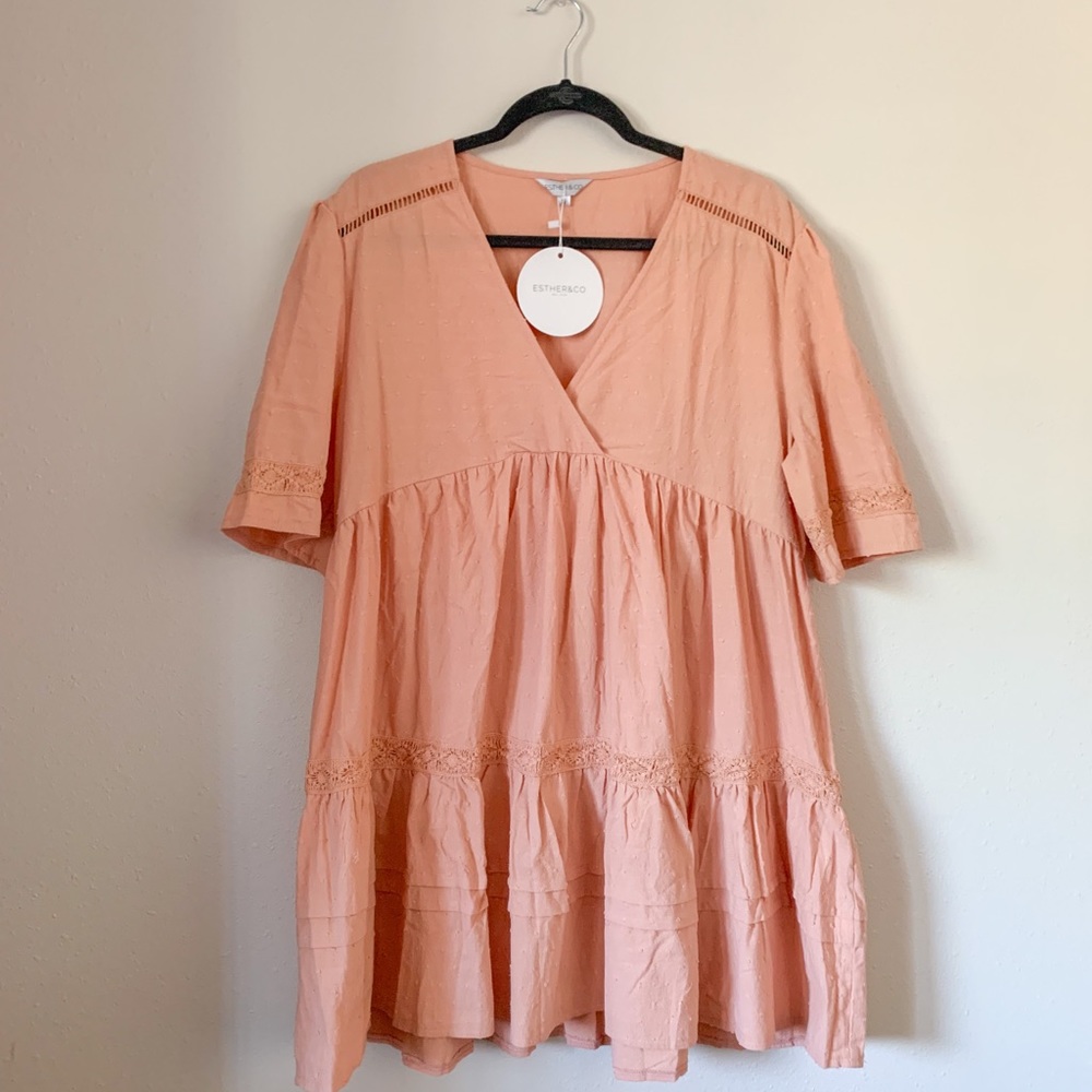 Beautiful Esther and Co. peach detailed tiered dress with V neckline.
